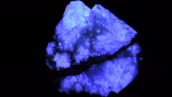 A calcite mineral specimen showing phosphorescence