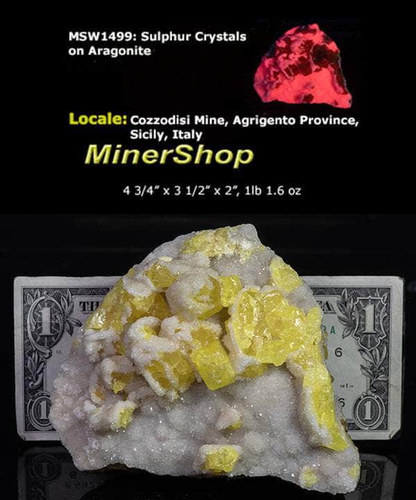 Yellow sulphur crystals sit atop an aragonite matrix
