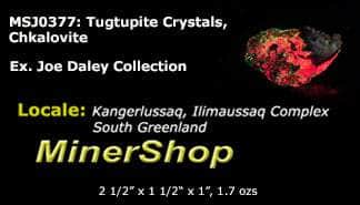 A smaller piece of our larger Kangerlussaq tugtupite specimens containing small tugtupite crystals dispersed throughout the matrix. 