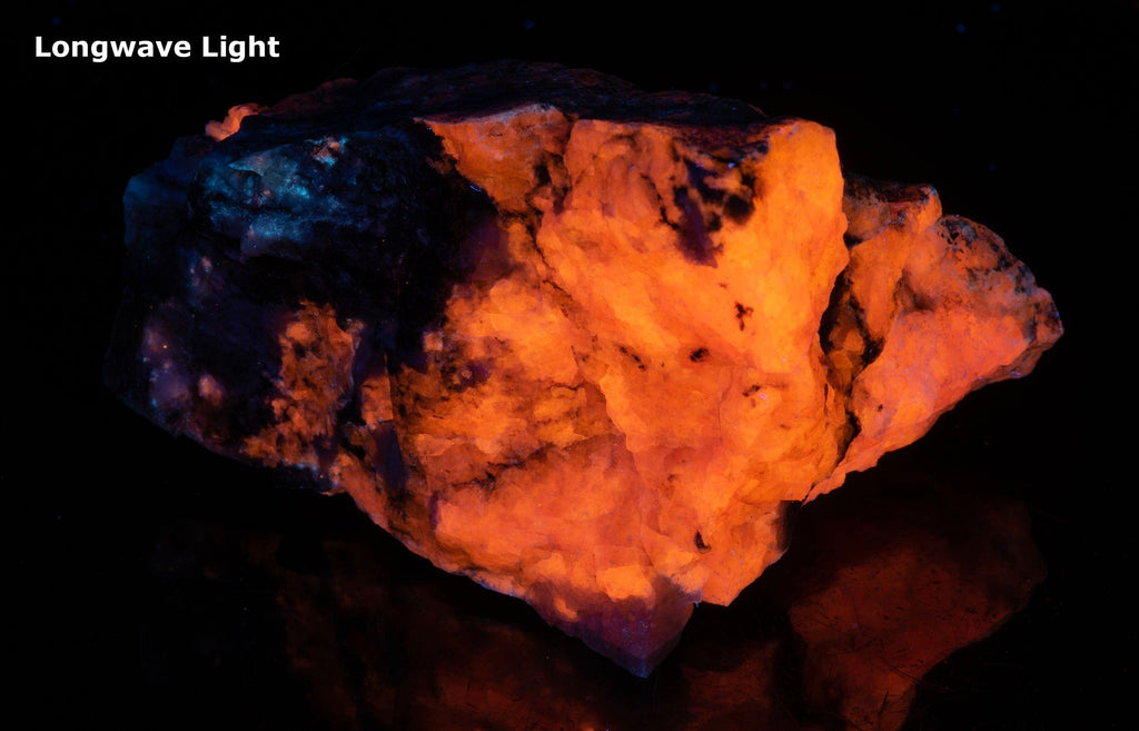 A great piece of sodalite (hackmanite) from Greenland with bright red-orange fluorescence under shortwave.