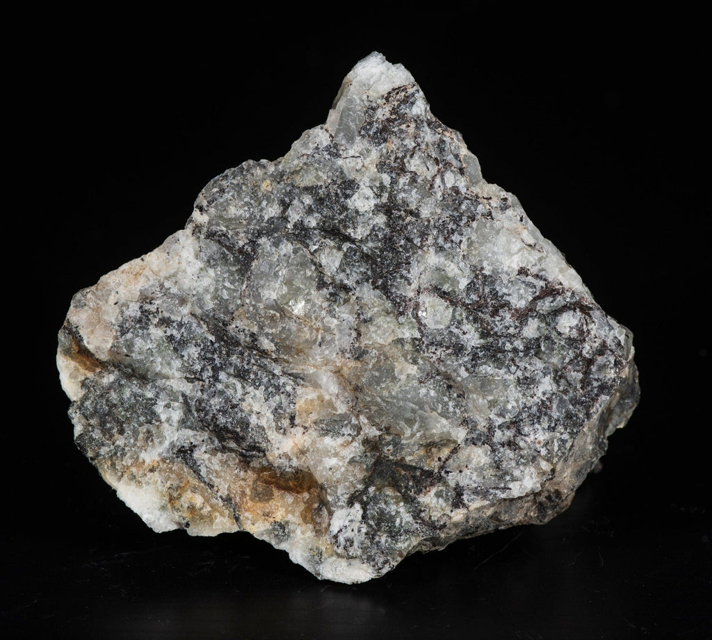 A photo of a fantasy rock from Greenland containing Tugtupite and Sodalite