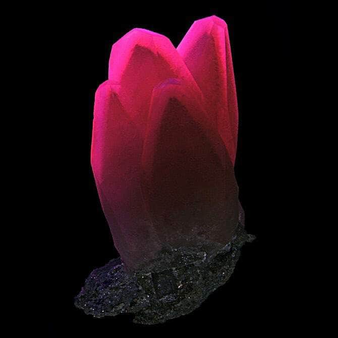 Calcite crystals under shortwave UV light