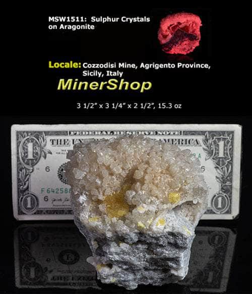 Yellow sulphur crystals sit atop an aragonite matrix