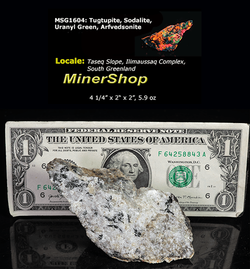 tugtupite (cherry red under shortwave UV light), fluorecent sodalite (orange) and black arfvedsonite