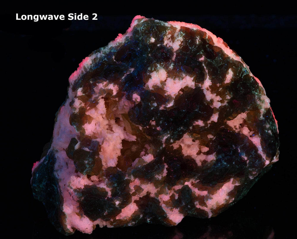 Yellow sulphur crystals sit atop an aragonite matrix