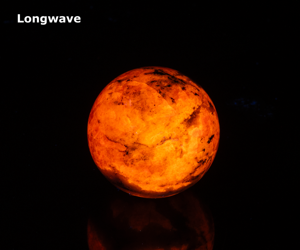 Fluorescent Sodalite Hackmanite Sphere from Greenland with Tenebrescence