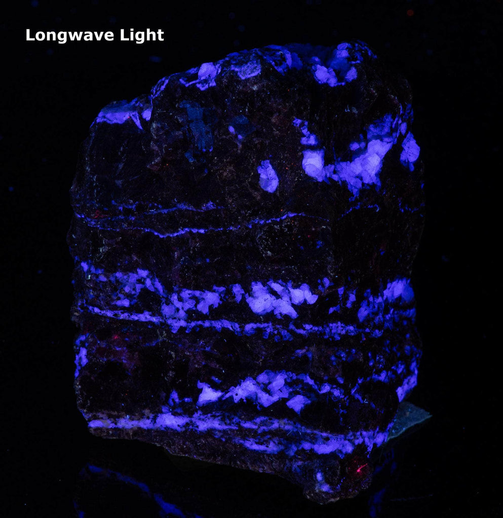 red fluorescent calcite, green fluorescent willemite and and blue fluorescent fluorite