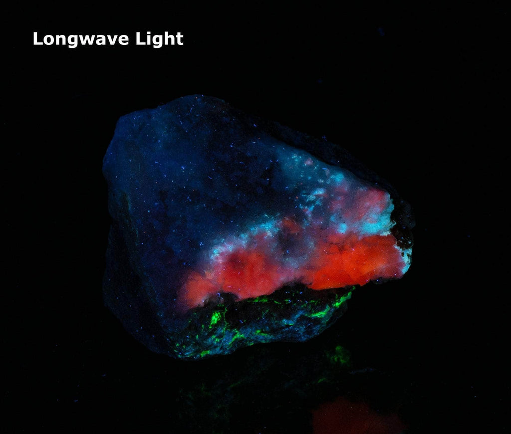 A classic piece of bright red fluorescent tugtupite 