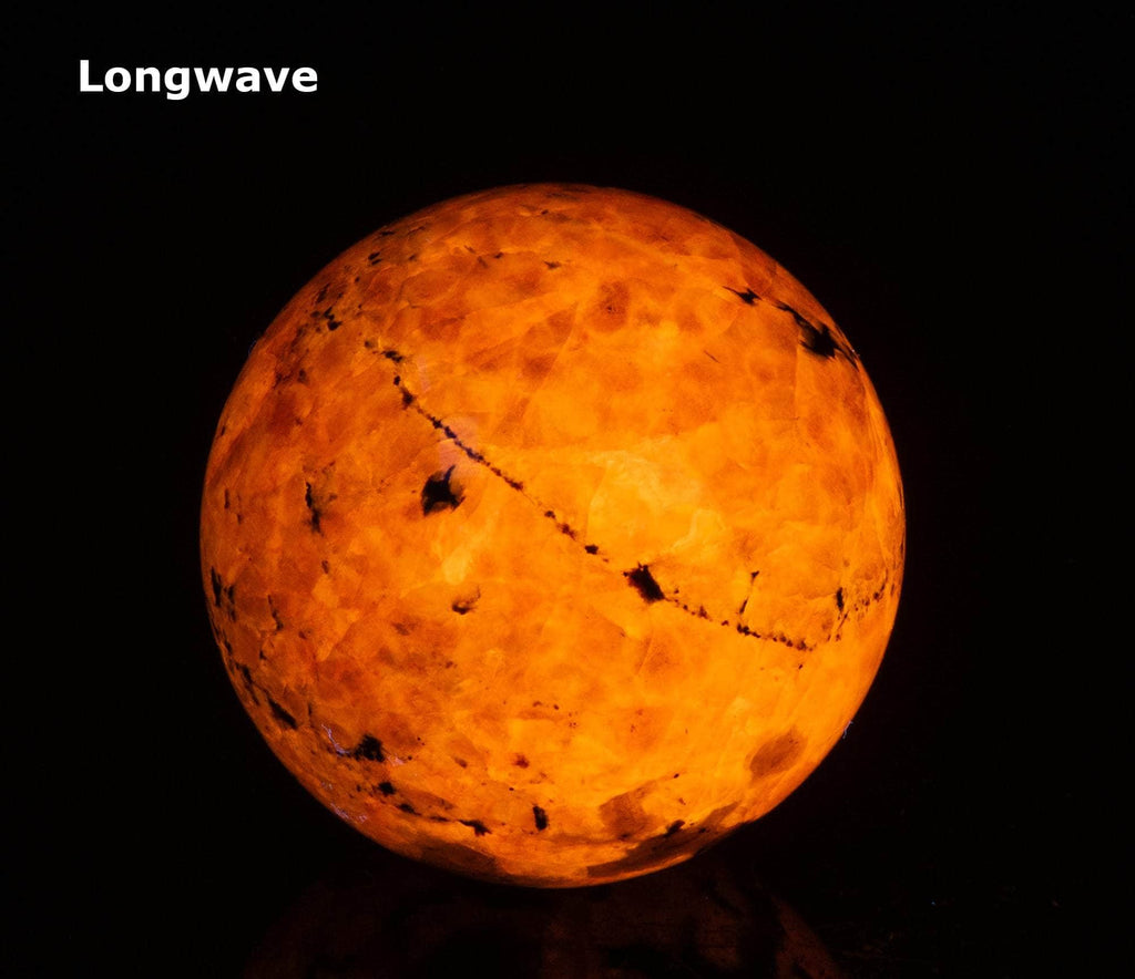 Fluorescent Sodalite Sphere, Very Tenebrescent