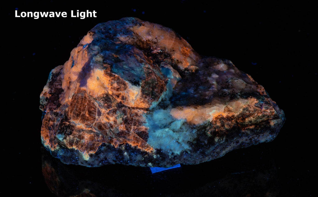 Hauyne, Gonnardite, Calcite, Scapolite, Phlogopite from Afghanistan under longwave UV light
