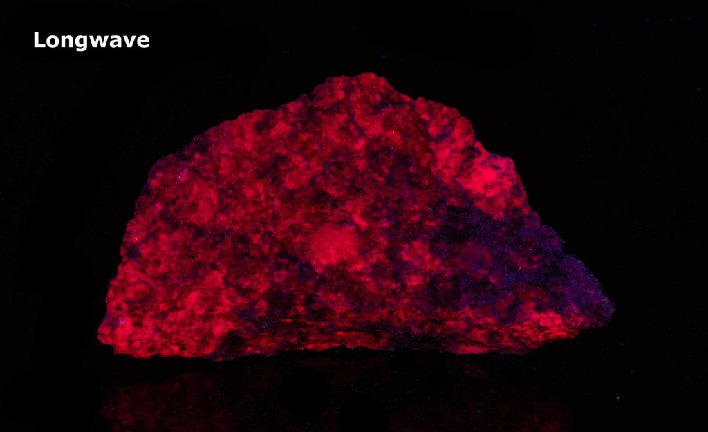 Bright red fluorescent ruby under longwave UV light