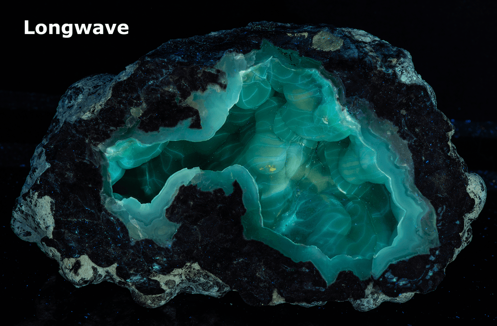A huge half geode with botryoidal chalcedony crystals inside. It fluoresces a bright green under UV light