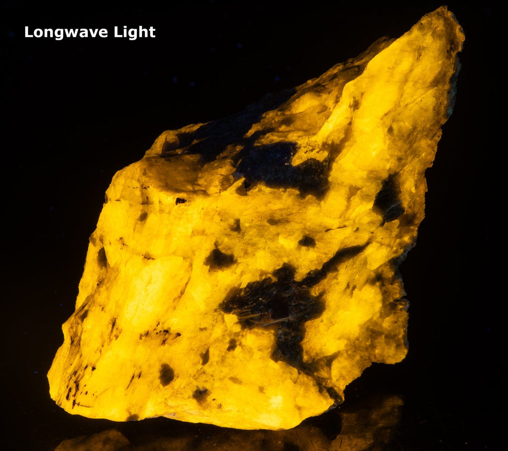 A fluorescent mineral rock of yellow wernerite