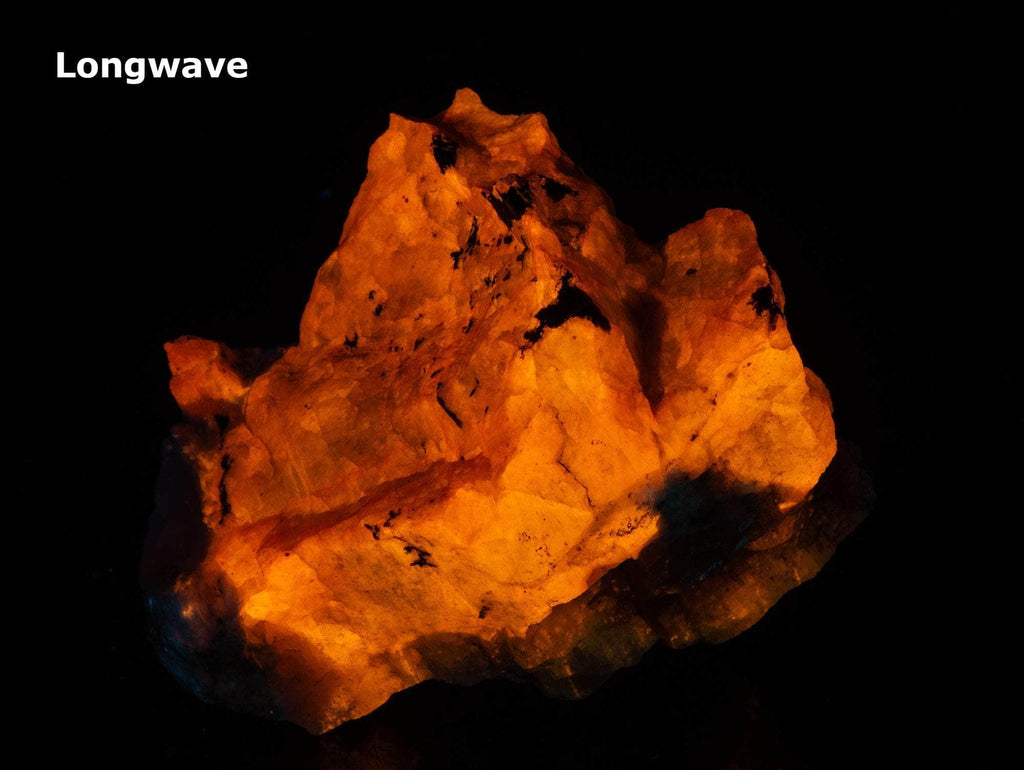 Fluorescent sodalite (Hackmanite) from Greenland with deep tenebrescence.