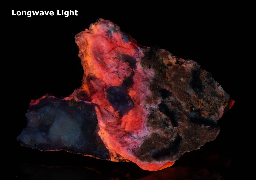 An incredible, unusual gemmy and extremely tenebrescent tugtupite specimen from Kangerlussaq.