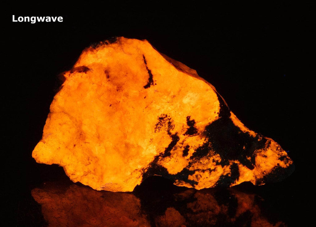 A deeply tenebrescent hackmanite sodalite specimen