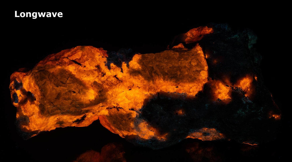 Fluorescent sodalite (Hackmanite) from Greenland with deep tenebrescence.