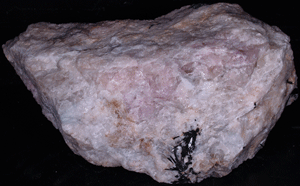 A piece of tenebrescent hackmanite or sodalite