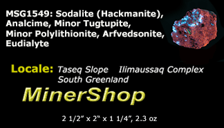 A deeply tenebrescent hackmanite sodalite specimen with minor tugtupite