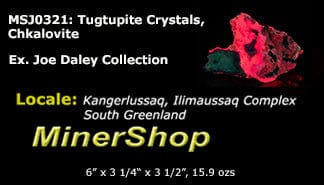 An incredible, unusual gemmy and extremely tenebrescent tugtupite specimen from Kangerlussaq.