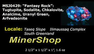 A piece of our highly sought after "Fantasy Rock". This piece features rich tugtupite that fluoresces a deep cherry red under shortwave UV.