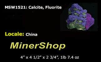  calcite in two different habits along with cubic honey brown fluorite crystals. 