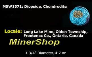 fluorescent diopside and chondrodite sphere from canada