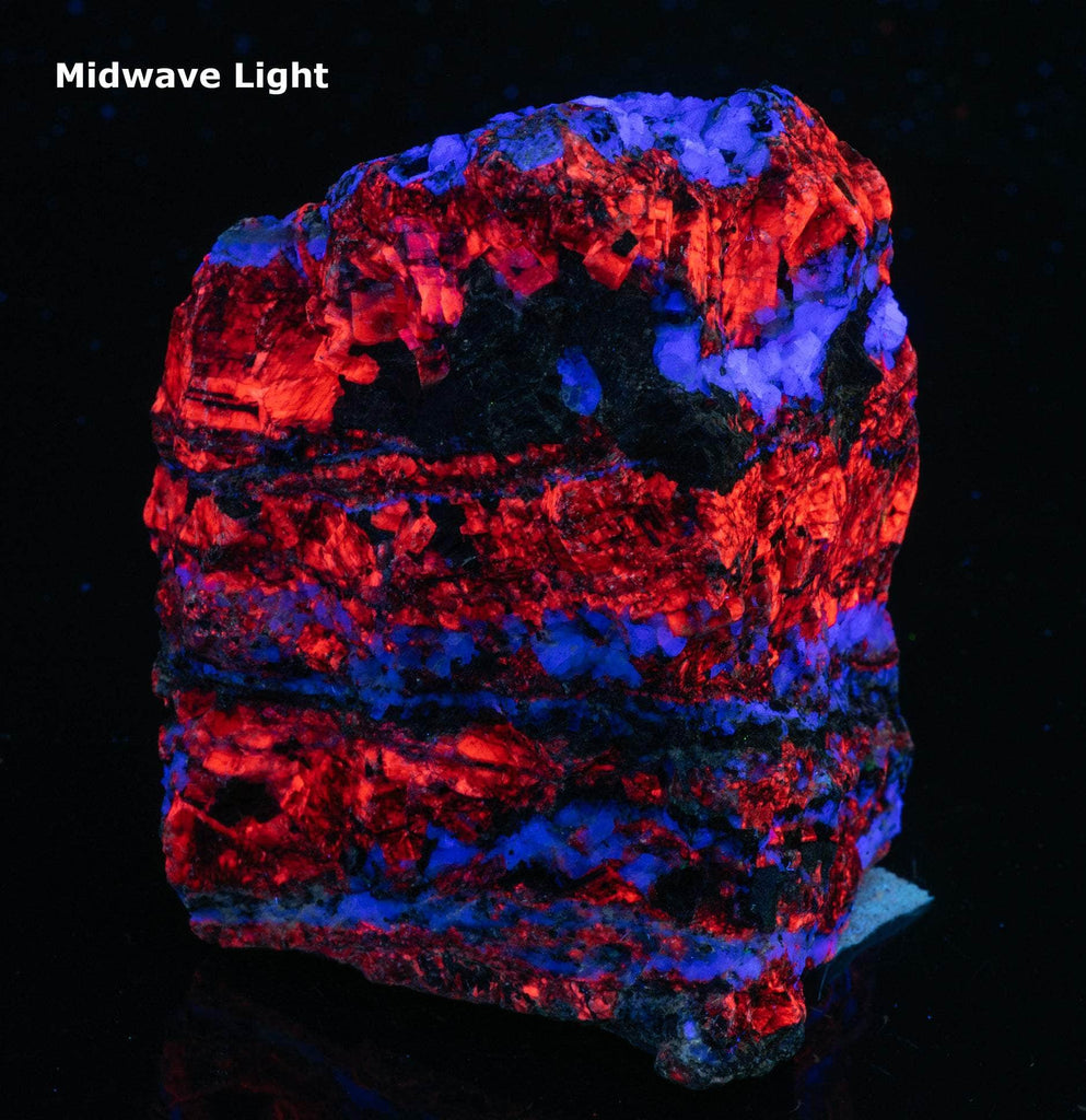 red fluorescent calcite, green fluorescent willemite and and blue fluorescent fluorite