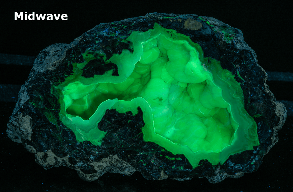 A huge half geode with botryoidal chalcedony crystals inside. It fluoresces a bright green under UV light