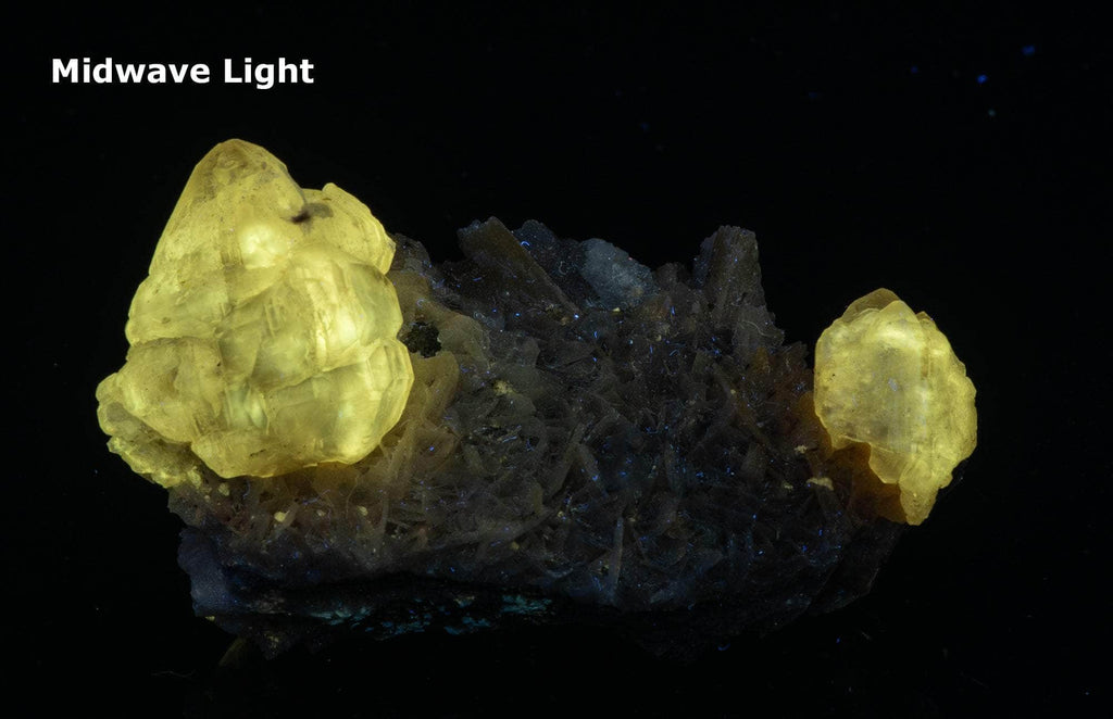 Fluorescent Cerussite Crystals on Barite