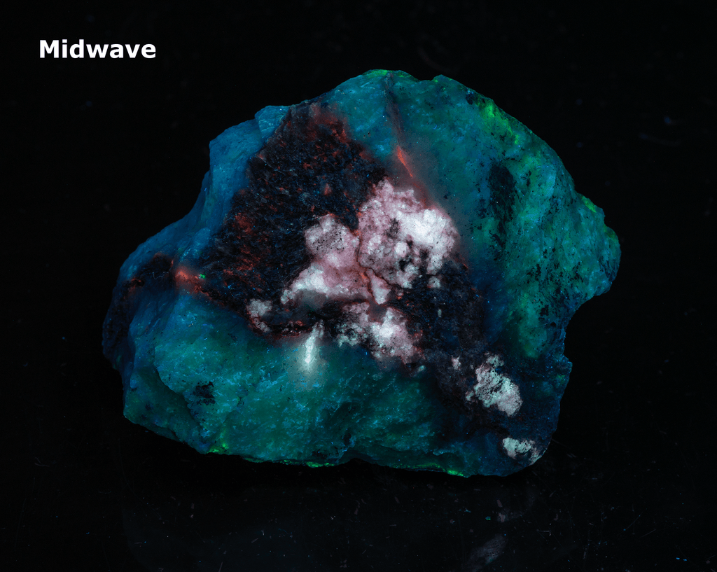 A mineral specimen that features rich polylithionite, tugtupite and chkalovite.