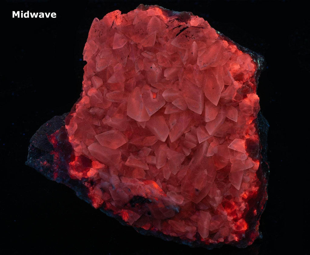 Honey calcite crystals that are nicely fluorescent under all wavelengths