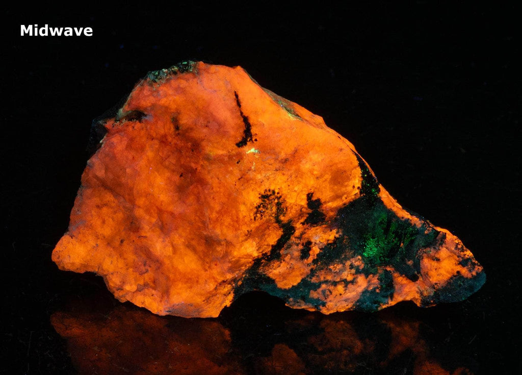 A deeply tenebrescent hackmanite sodalite specimen