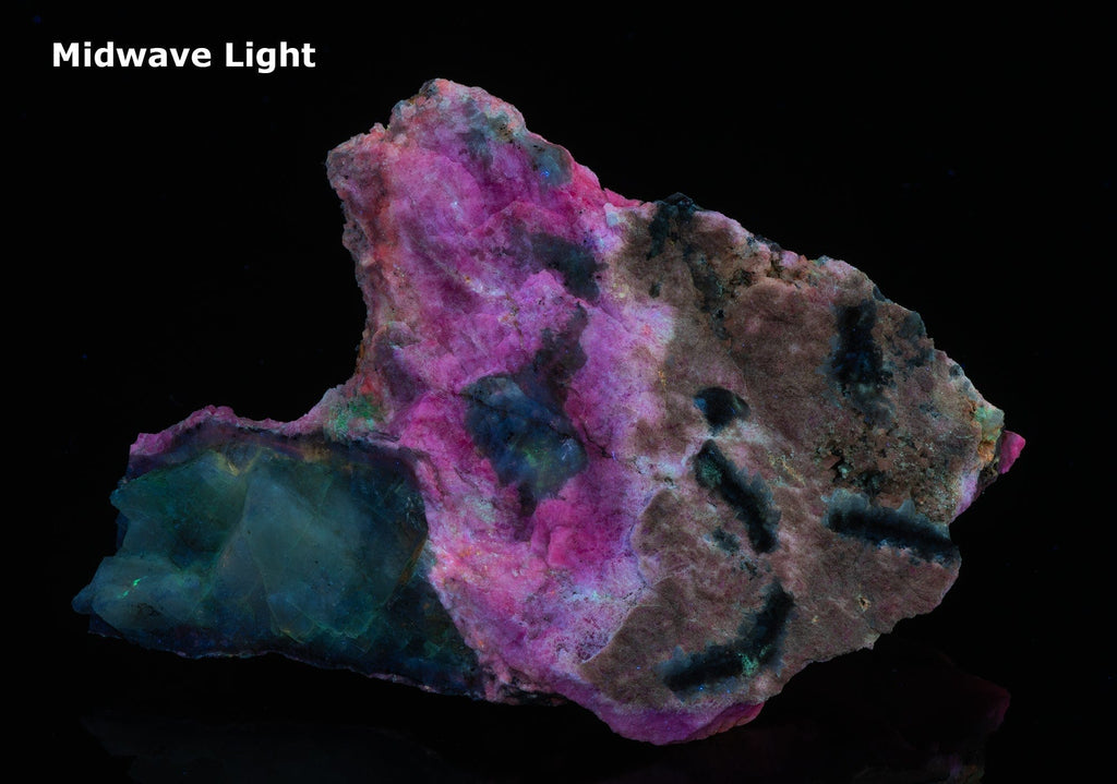 An incredible, unusual gemmy and extremely tenebrescent tugtupite specimen from Kangerlussaq.