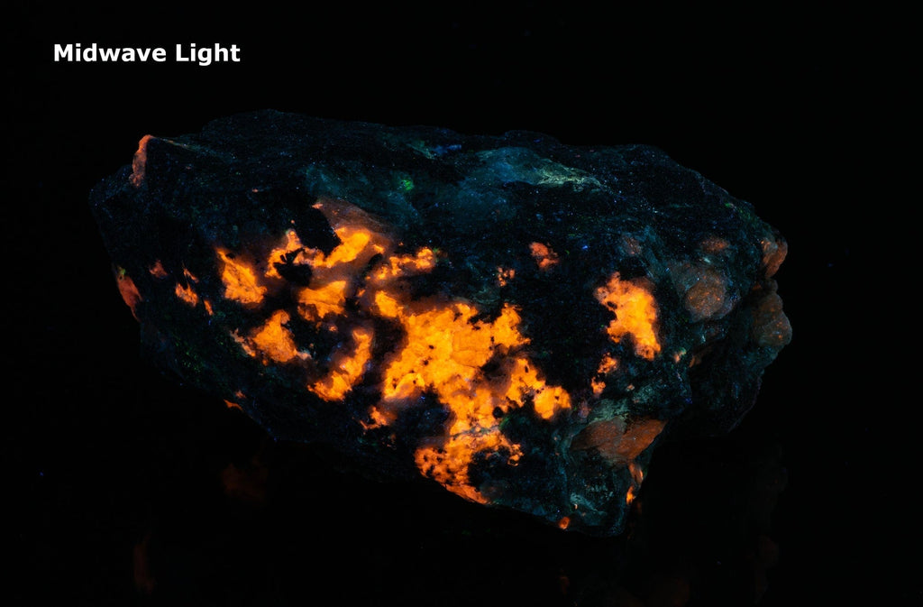 A piece of blue sodalite fluorescent under UV from Greenland