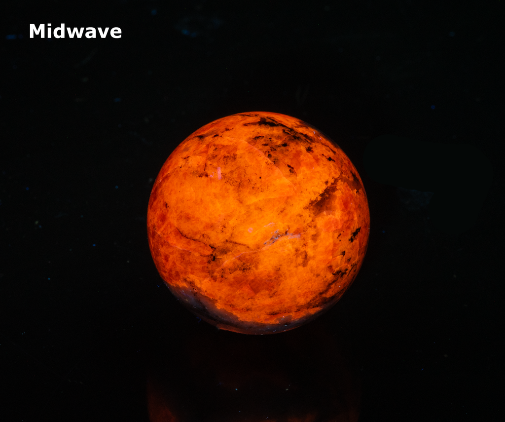Fluorescent Sodalite Hackmanite Sphere from Greenland with Tenebrescence