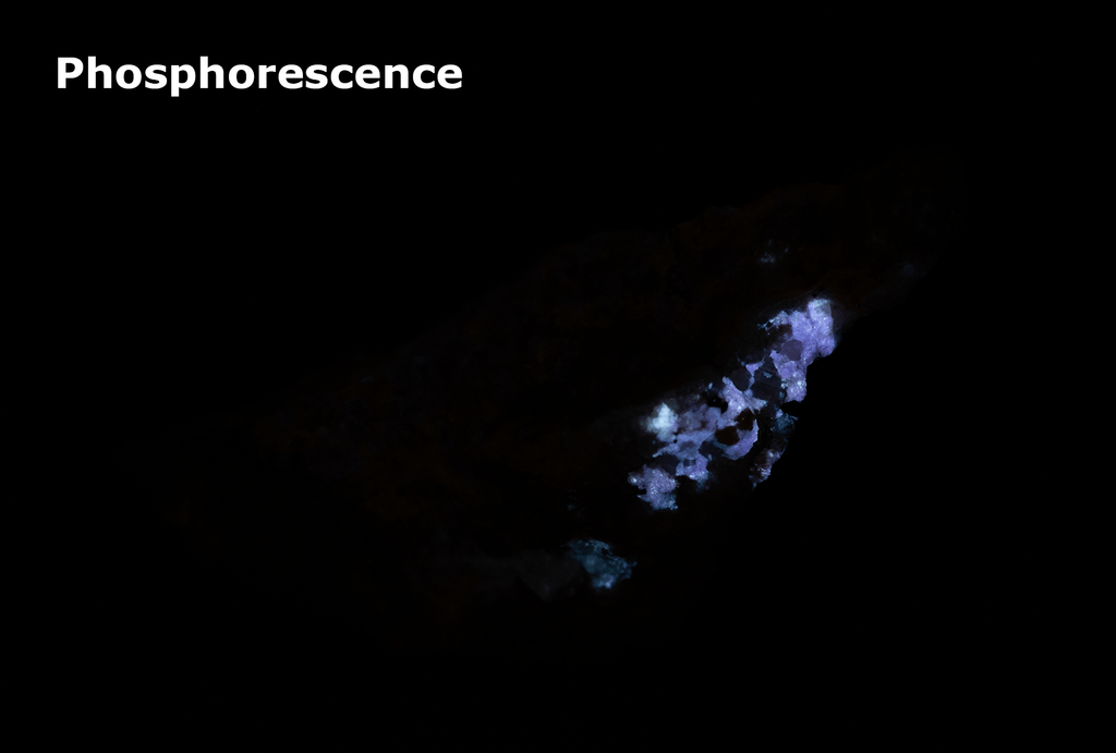 tugtupite (cherry red under shortwave UV light), fluorecent sodalite (orange) and black arfvedsonite