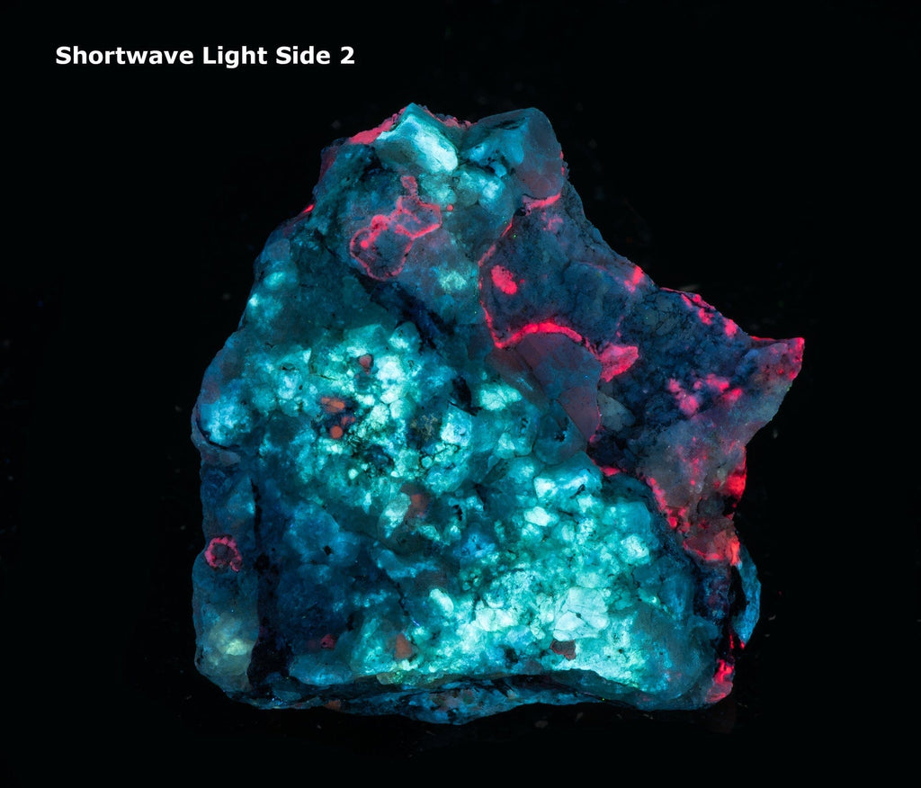 A nice piece of tenebrescent fantasy rock with broad areas of blue fluorescing analcime and exquisite tugtupite veining.  Areas of orange are fluorescent sodalite.