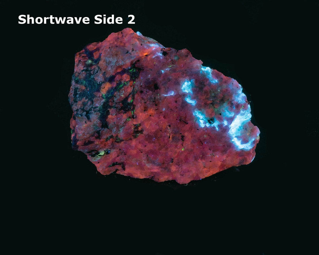 A deeply tenebrescent hackmanite sodalite specimen with minor tugtupite