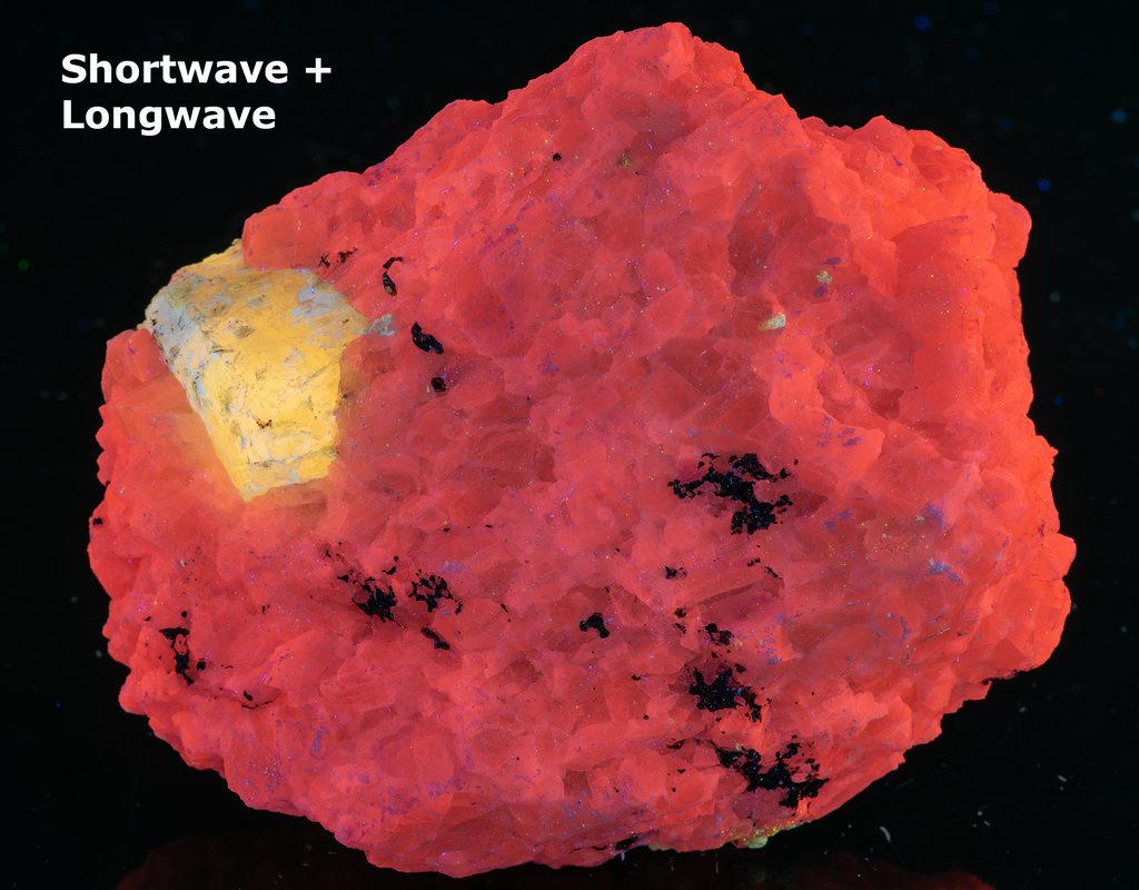 A huge specimen with a very nice, well-formed marialite (scapolite) crystal, fluorescent a bright yellow under longwave UV, on a calcite matrix