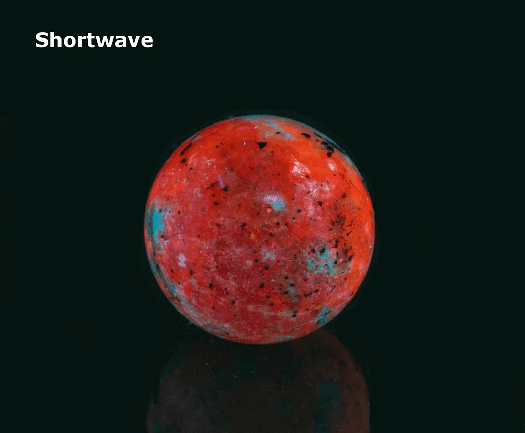 tenebrescent and fluorescent sodalite sphere