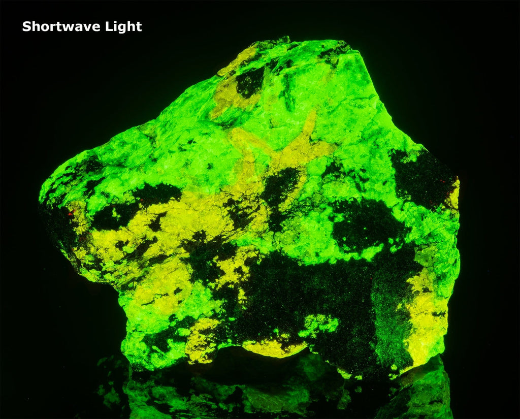 A very large, rare esperite (blindingly bright yellow), willemite (green) from the Parker Shaft in Franklin, NJ