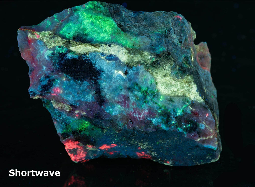 Tenebrescent and phosphorescent tugtupite, polylithionite mineral specimen from Greenland
