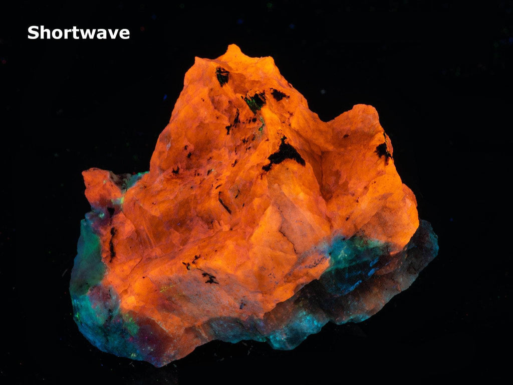 Fluorescent sodalite (Hackmanite) from Greenland with deep tenebrescence.