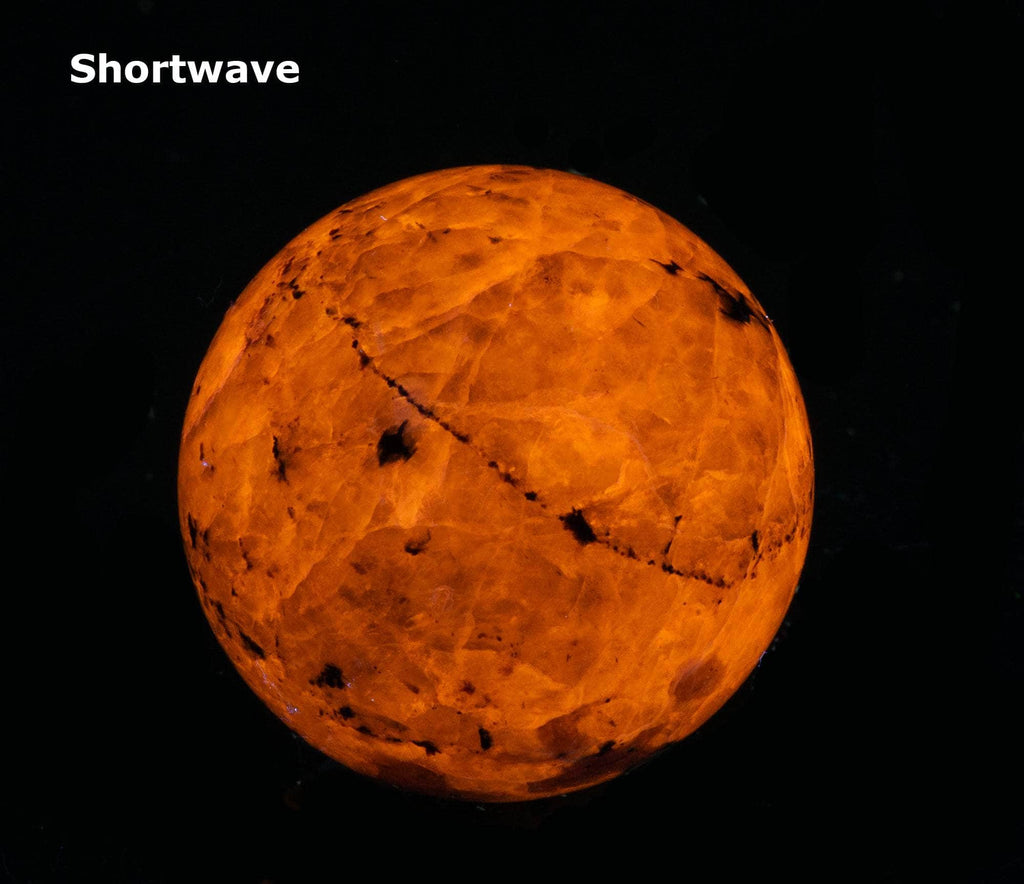 Fluorescent Sodalite Sphere, Very Tenebrescent
