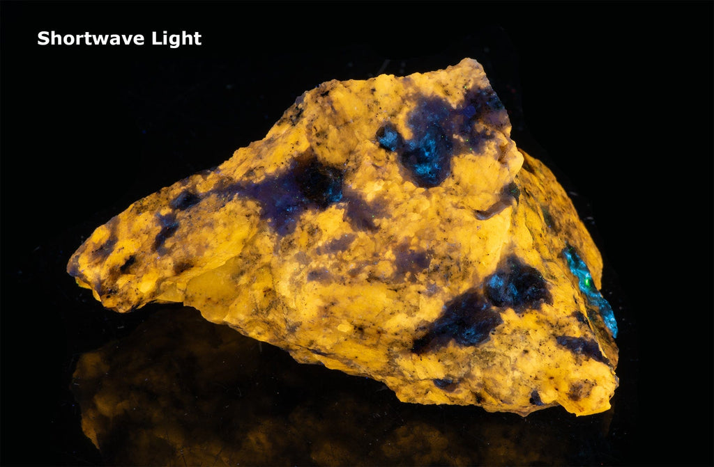 A fluorescent mineral rock of yellow wernerite