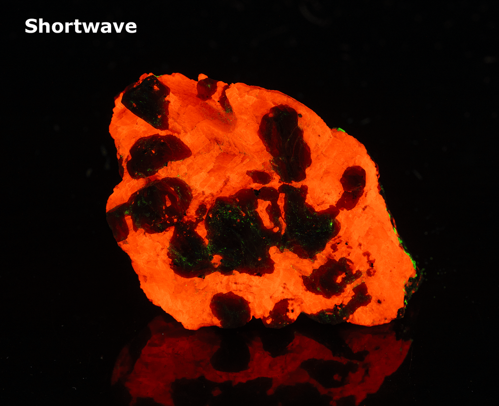 Deep Pink Rhodonite Crystals with Fluorescing Calcite from Franklin Mine