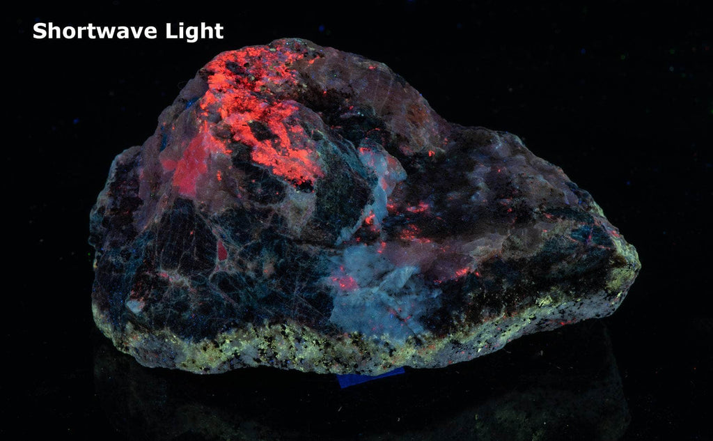 Hauyne, Gonnardite, Calcite, Scapolite, Phlogopite from Afghanistan under shortwave UV light