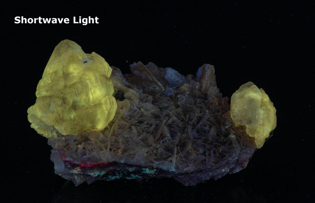 Fluorescent Cerussite Crystals on Barite
