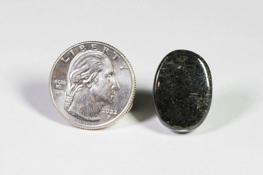 A cabochon of black nuummite from Greenland